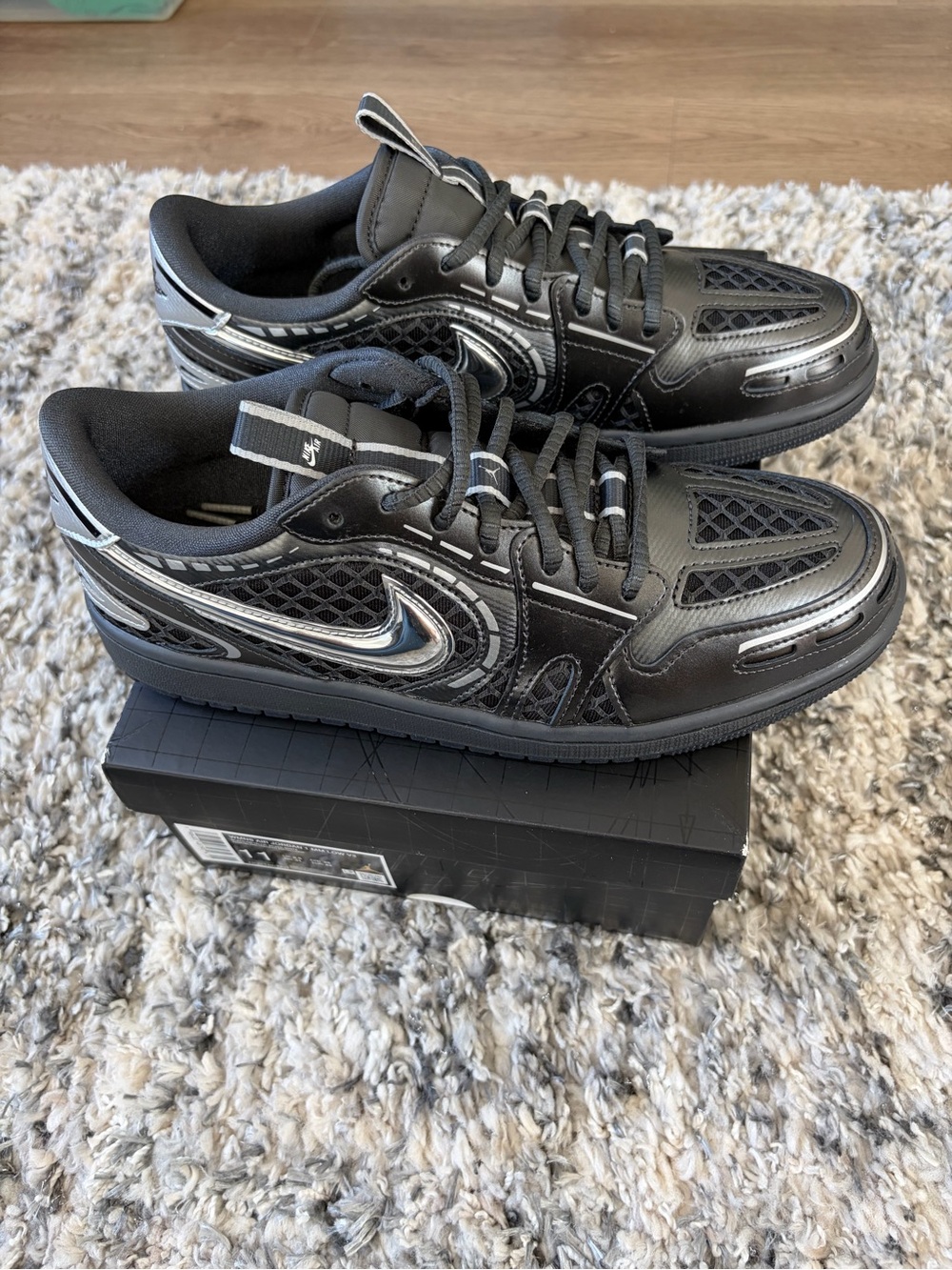 Nike Women’s Black Sneakers with Silver Accents